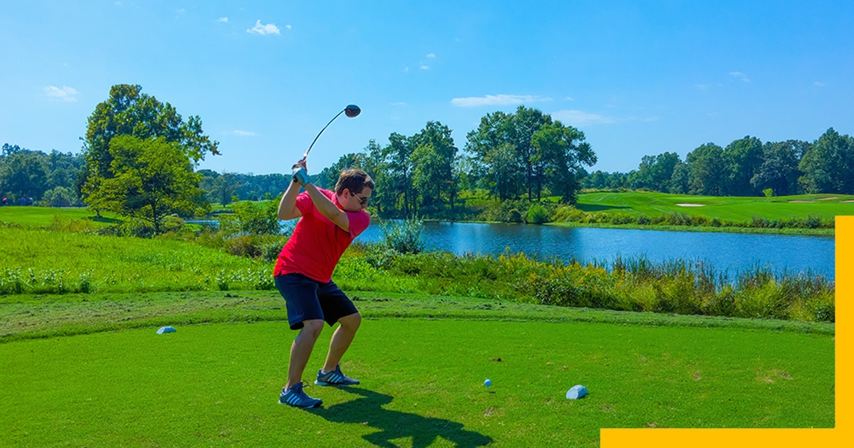 A man playing golf