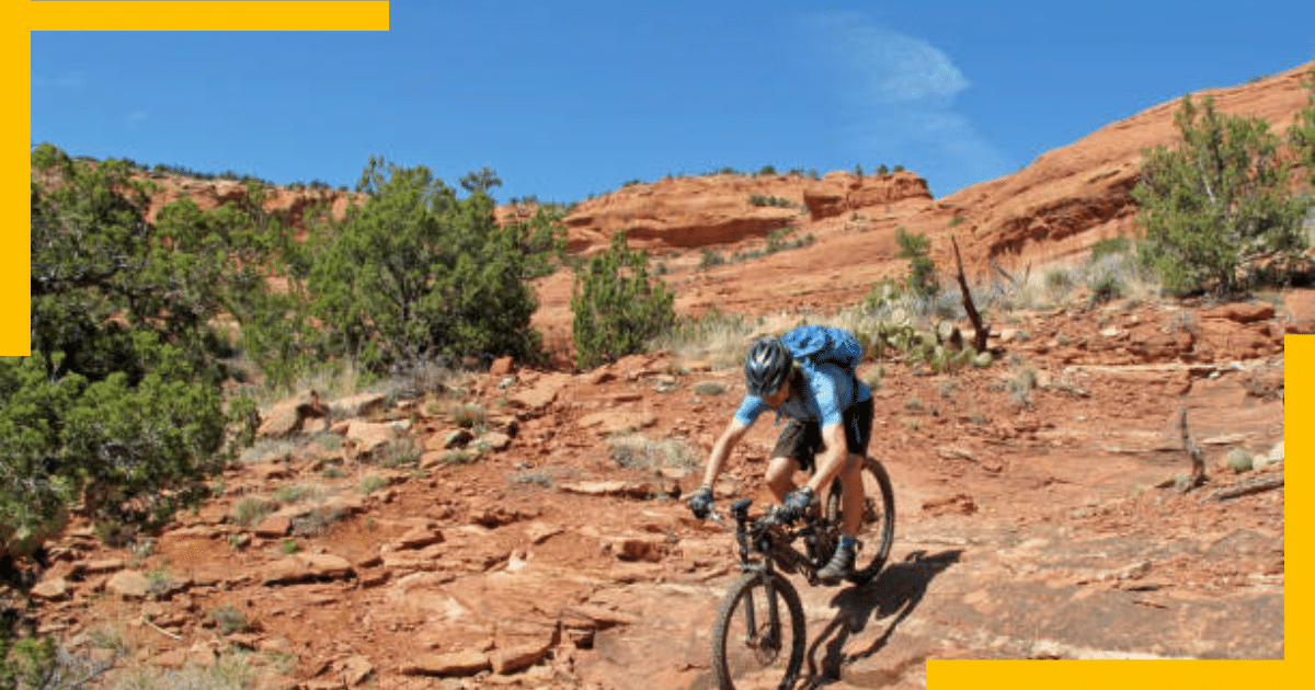 A man Mountain Biking in Sedona