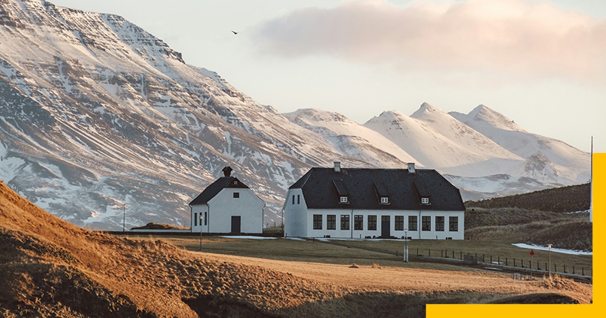 A Red Barn sits on a Grassy Hill , Reykjavik,Iceland