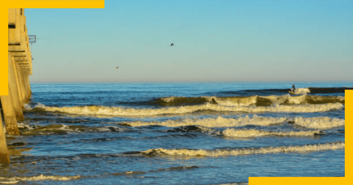 A man surfing in the sea