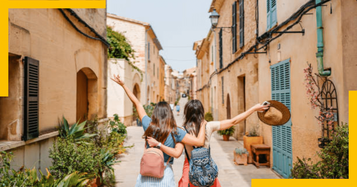 Two girls wandering through the streets of Spain