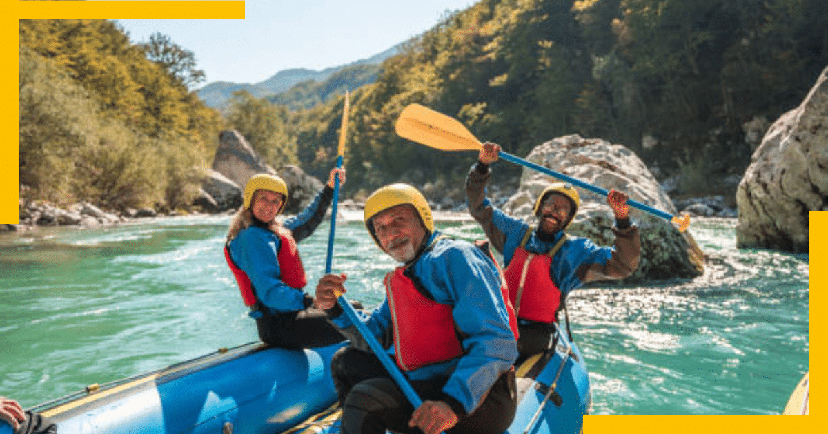 A group of travellers enjoying kayaking in the sea 