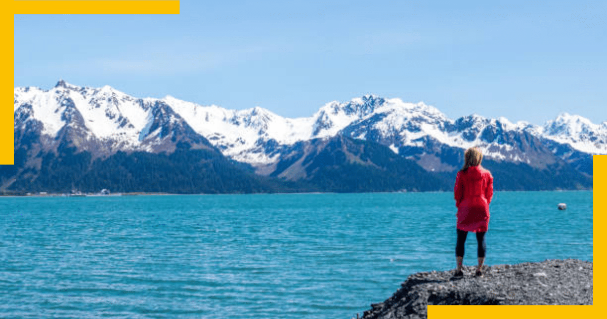 A woman sightseeing the Kenai Fjords in Seward, Alaska