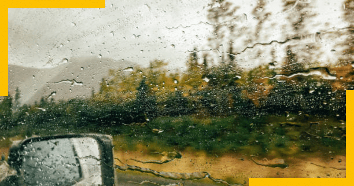 Rain droplets on car's window glass