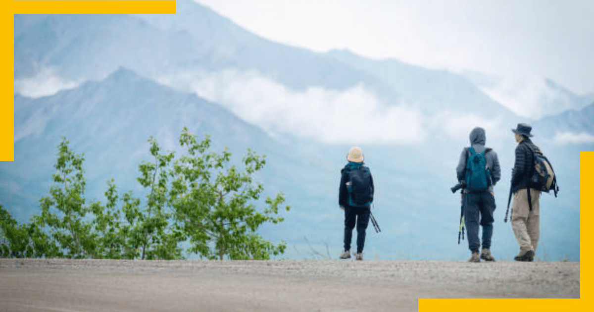 Three people hiking in Girdwood, Alaska