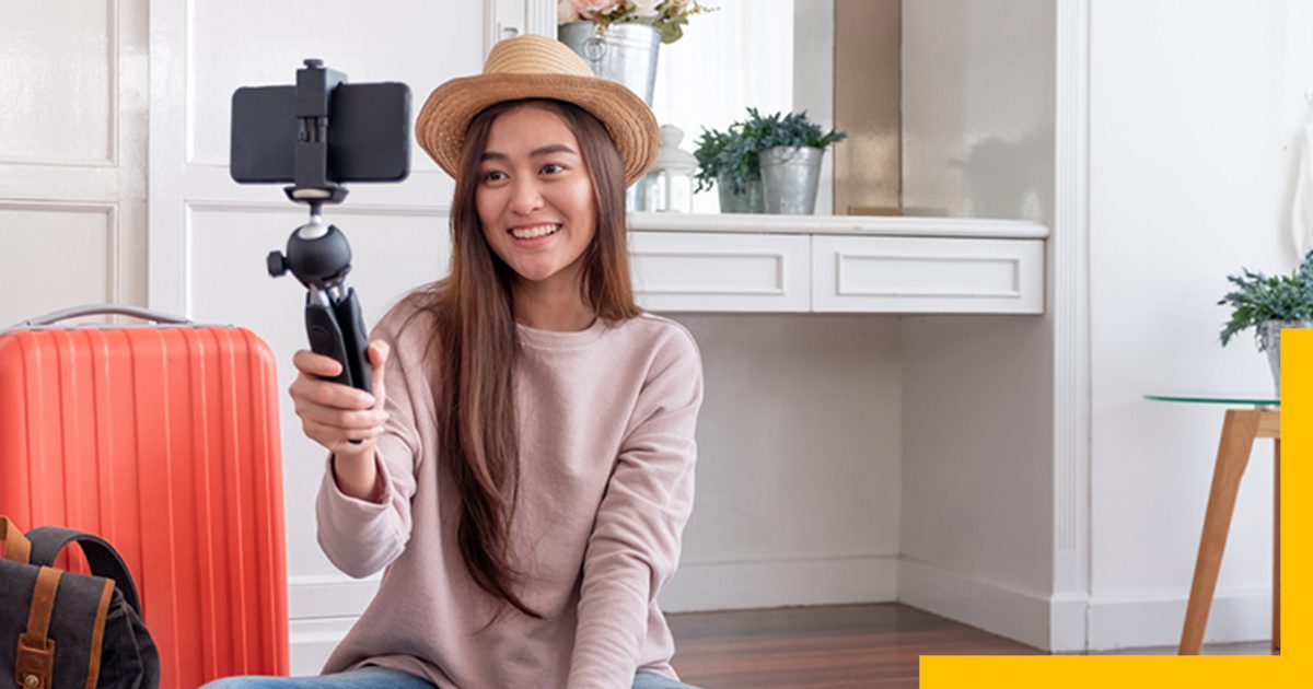 How to Become a Travel Influencer, girl recording her video inside a hotel
